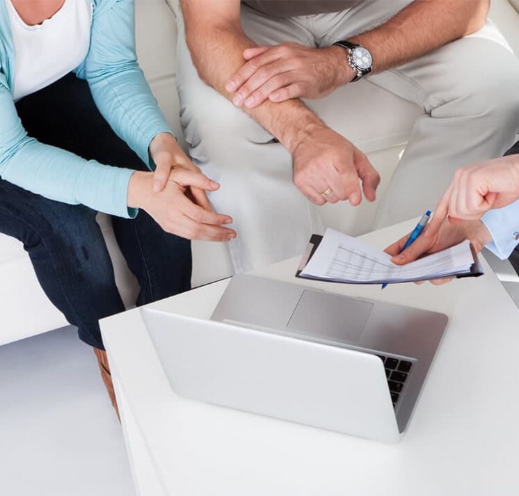 Consultant Showing Document To Couples — Dispute Resolution in Port Macquarie, NSW