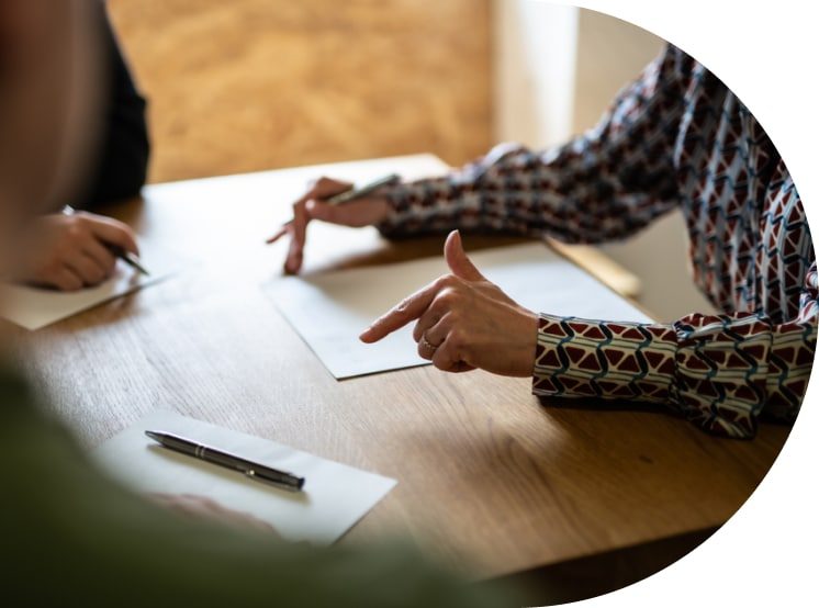 Attorney Discussing Terms In Paper — Dispute Resolution in Port Macquarie, NSW